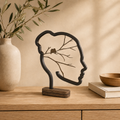 Vionel Mind Tree Dekoskulptur auf hellem Holz-Sideboard in ruhiger Wohnszene.
